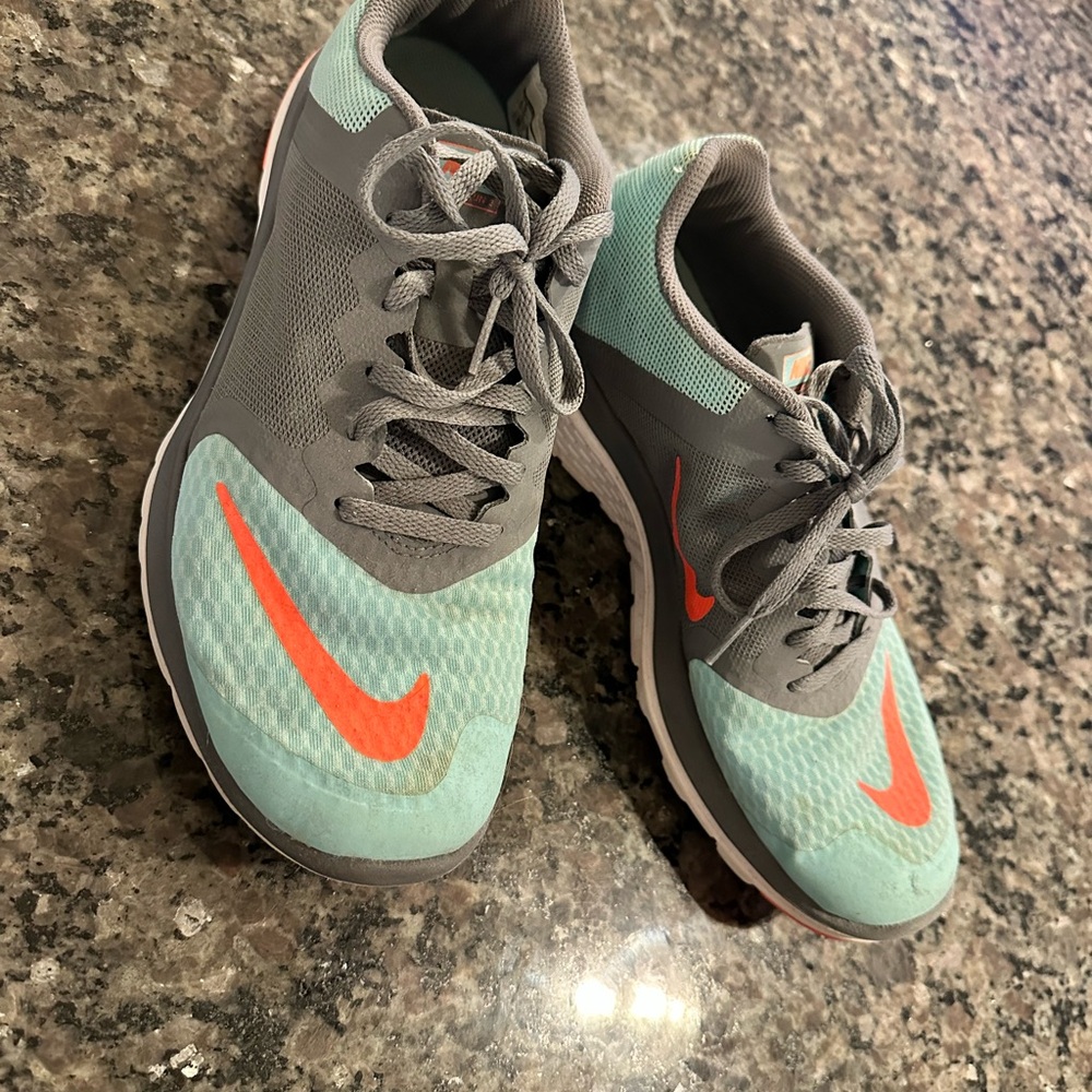 Nike Teal and Gray Running Shoes with Orange Swoosh